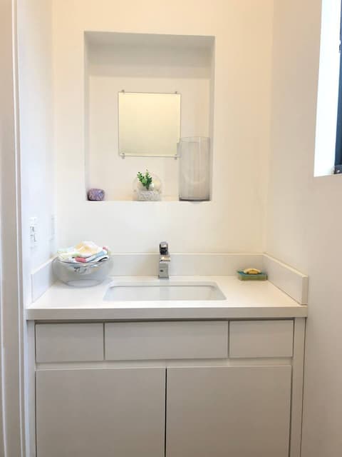 guest bathroom right when you walk in