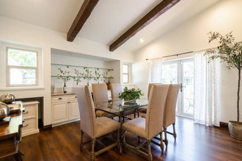 Inviting dining space for unforgettable family gatherings with delectable cuisine and beverages.