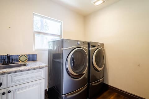 Laundry facilities with washer and dryer, enhancing your stay with extra convenience.