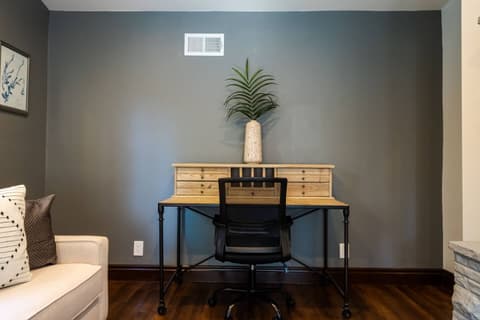 Spacious living area, perfect for social gatherings with friends or productive remote work sessions.