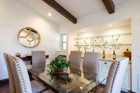 Inviting dining space for unforgettable family gatherings with delectable cuisine and beverages.
