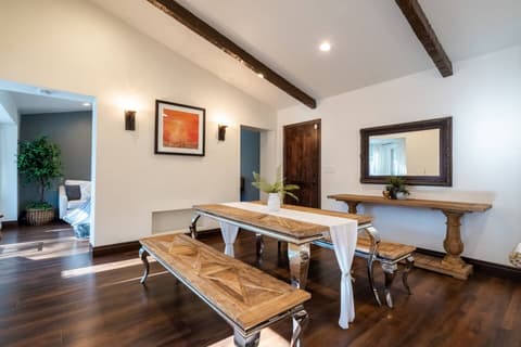 Inviting living area with ample room for relaxation and socializing with friends in a comfortable ambiance.