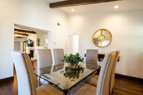 Inviting dining space for unforgettable family gatherings with delectable cuisine and beverages.