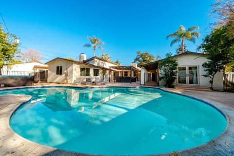 Inviting heated pool with cozy areas for a delightful experience.