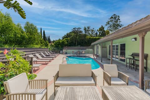 An extensive garden with a magnificent, deep pool, inviting our guests to unwind in serenity and have fun, all while relishing stunning sunset vistas.