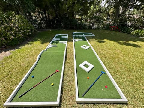 Enjoy a mini golf experience with 2 holes right in the backyard.