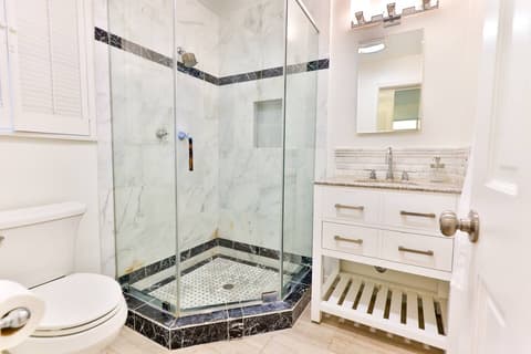Experience the luxury of a generously-sized bathroom. Discover a haven of comfort and sophistication during your stay.